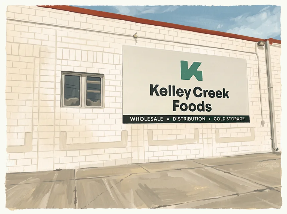 A painting of the Kelley Creek Foods building in Albert Lea, with the sign on the wall